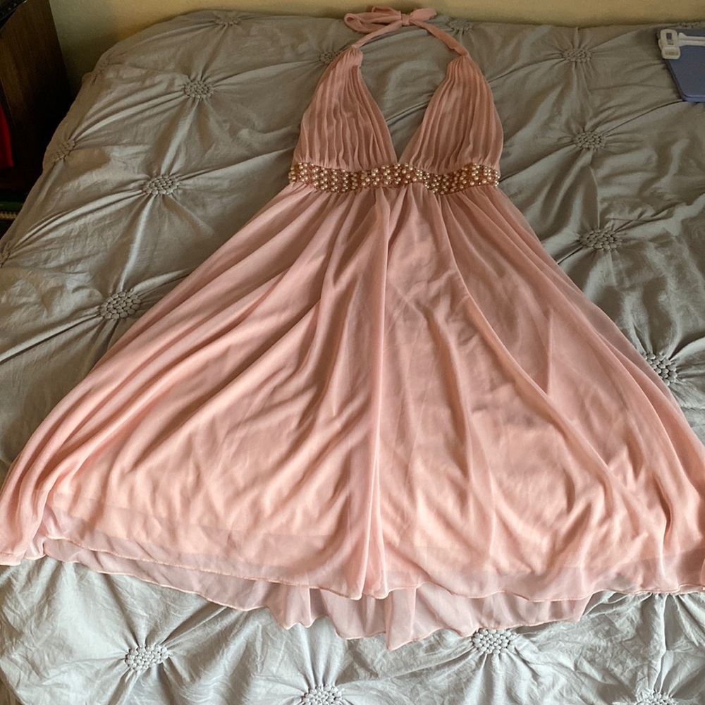 Backless, tie top dress. Sequins and pearls Good condition